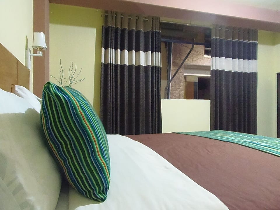 City Double Room, Multiple Beds, Non Smoking | 2 bedrooms, down comforters, WiFi (free), bed sheets