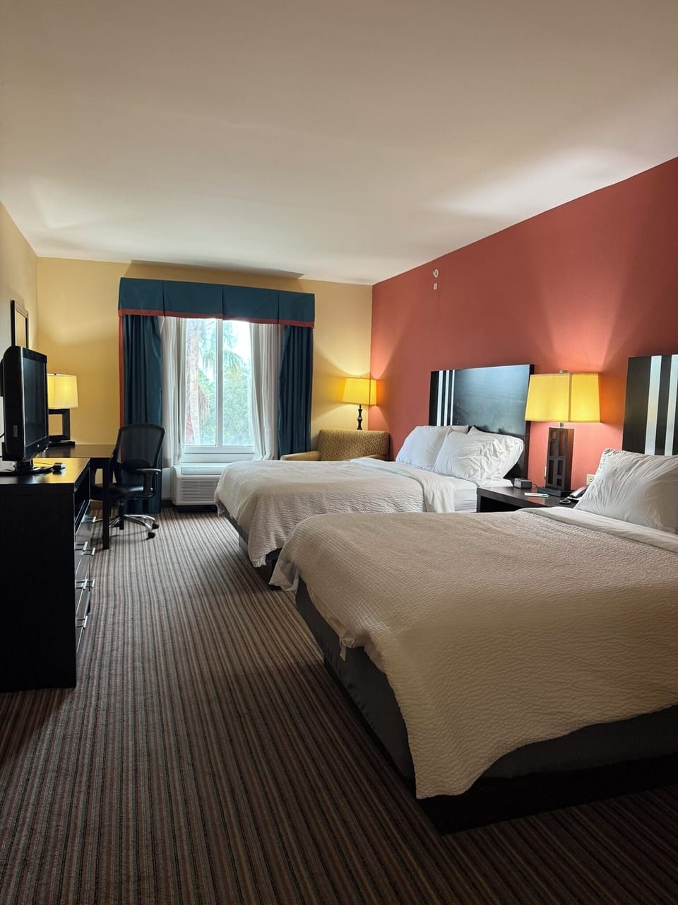 In-room safe, desk, iron/ironing board, free cribs/infant beds