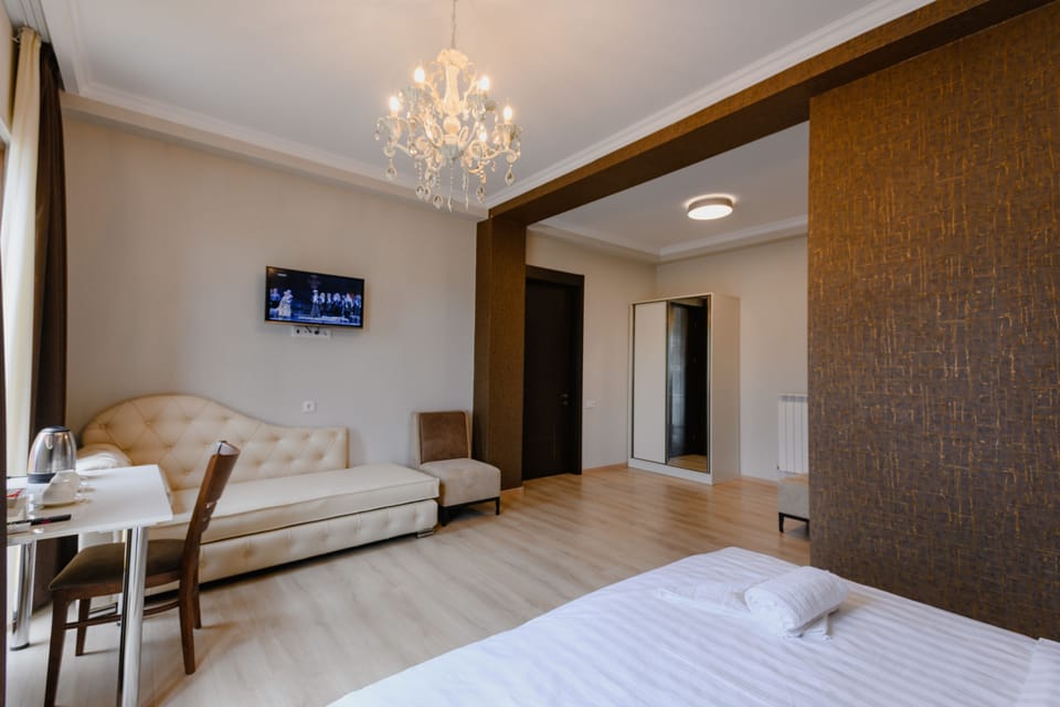 Deluxe Double Room (with veranda) | Minibar, in-room safe, desk, blackout drapes