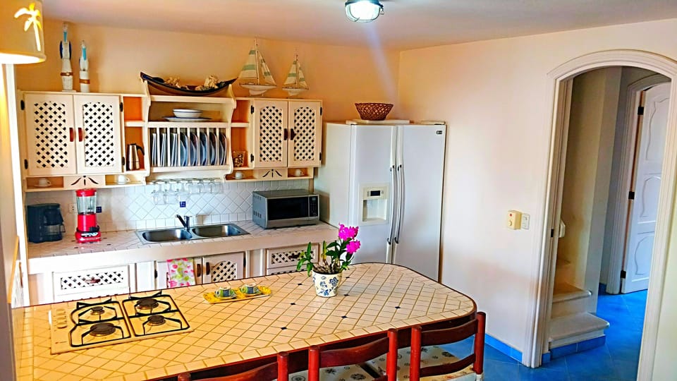 Family Apartment, 3 Bedrooms, Beach View, Beachfront | Private kitchen | Fridge, microwave, coffee/tea maker, toaster