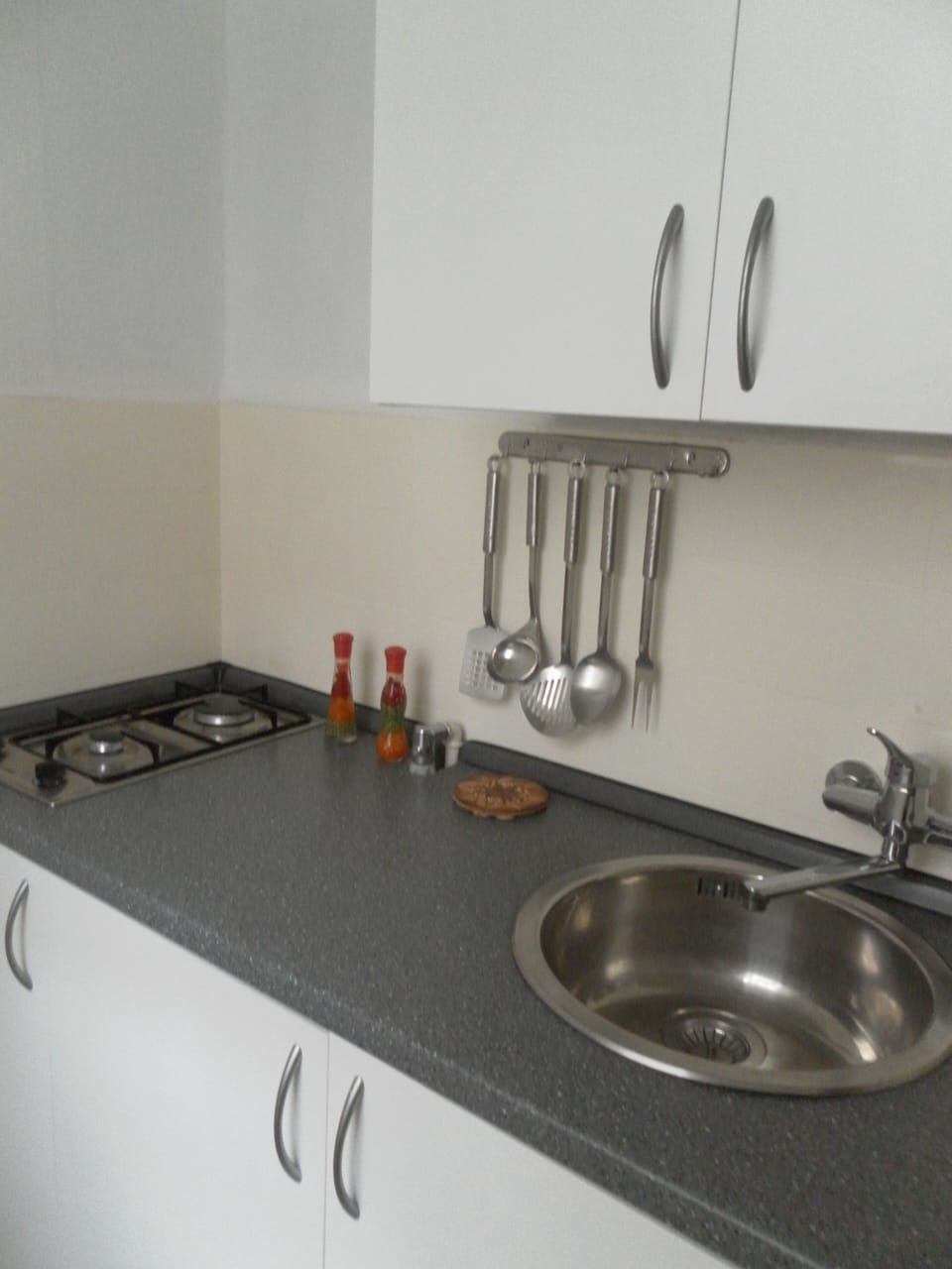 Apartment, Balcony | Private kitchen | Fridge, microwave, stovetop, coffee/tea maker