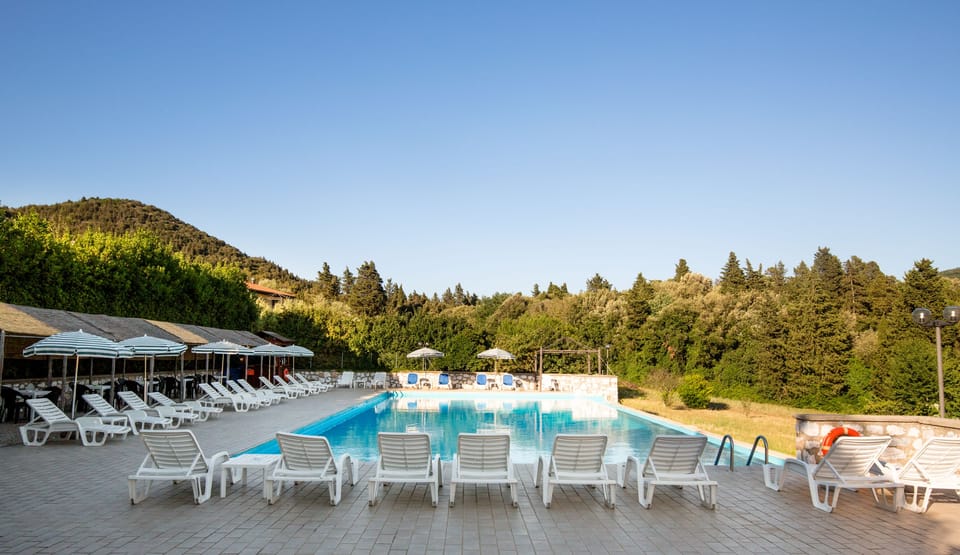 Outdoor pool, open 7:30 AM to 8:00 PM, sun loungers
