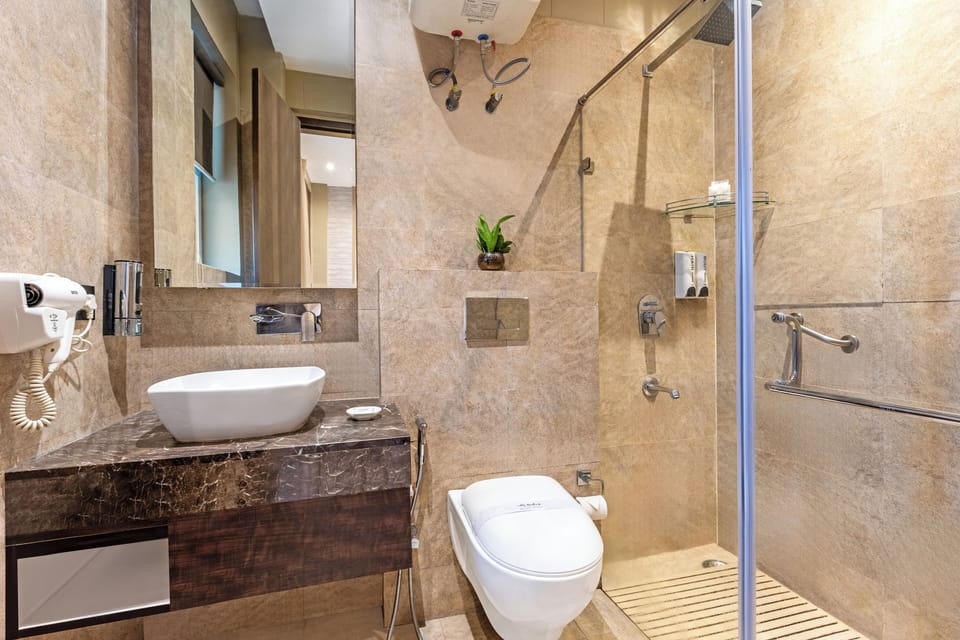 Classic Room | Bathroom | Free toiletries, hair dryer, slippers, towels