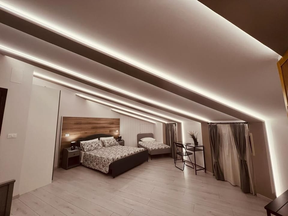 Deluxe Quadruple Room | Premium bedding, memory foam beds, in-room safe, free WiFi