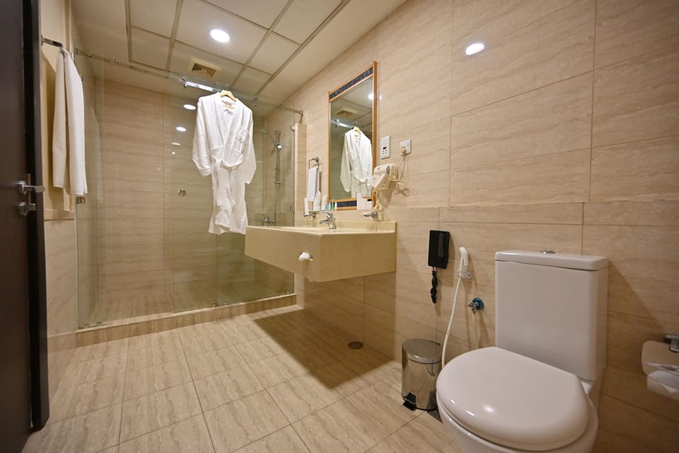 Luxury Suite, 2 Bedrooms, Sea View | Bathroom | Shower, free toiletries, hair dryer, bathrobes