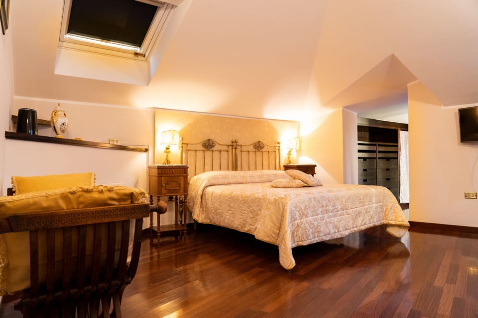 Junior Quadruple Room, Terrace | In-room safe, individually decorated, soundproofing, free WiFi