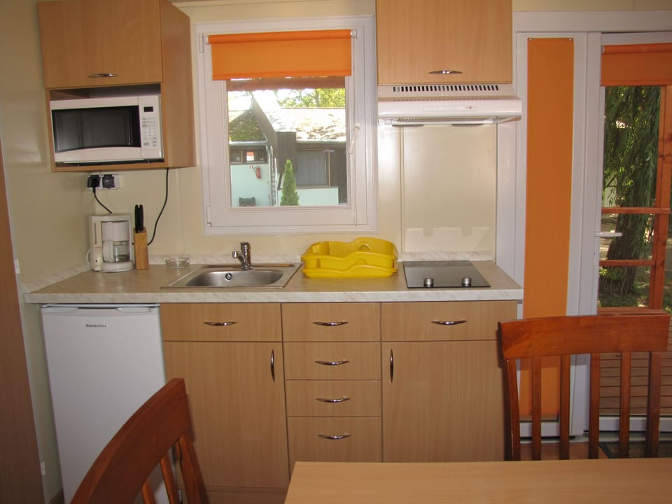 Standard Mobile Home | Private kitchen | Fridge, microwave, stovetop, coffee/tea maker