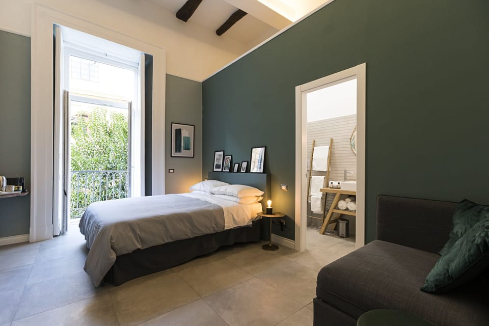 Superior Triple Room | Minibar, in-room safe, desk, soundproofing