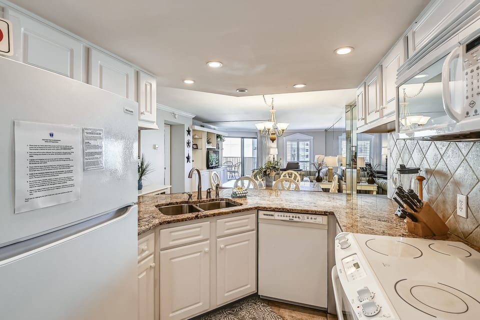 Condo, 2 Bedrooms | Private kitchen | Fridge, microwave, oven, dishwasher