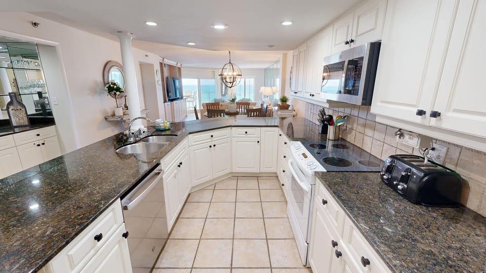 Condo, 2 Bedrooms | Private kitchen | Fridge, microwave, oven, dishwasher