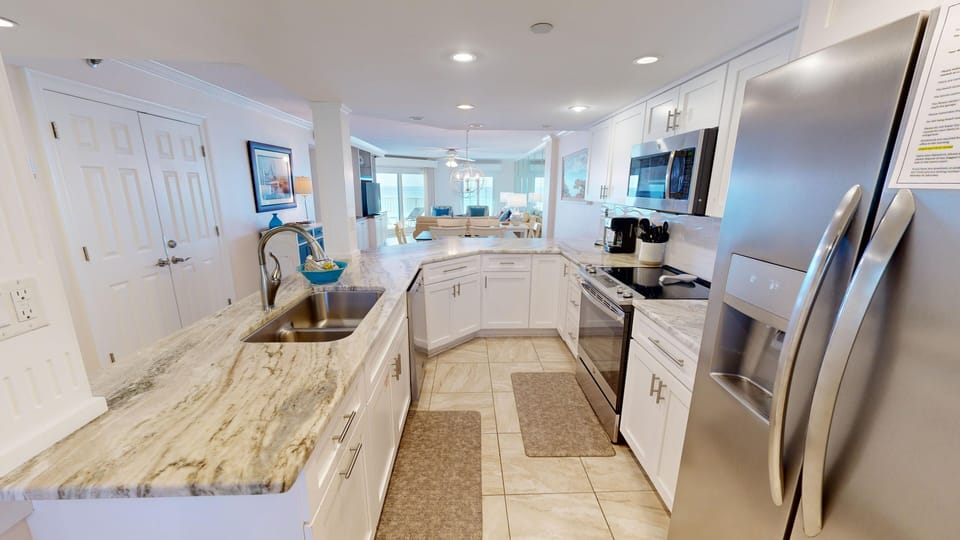 Condo, 2 Bedrooms | Private kitchen | Fridge, microwave, oven, dishwasher
