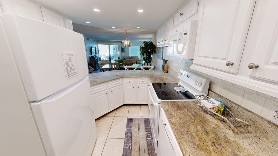Condo, 2 Bedrooms | Private kitchen | Fridge, microwave, oven, dishwasher