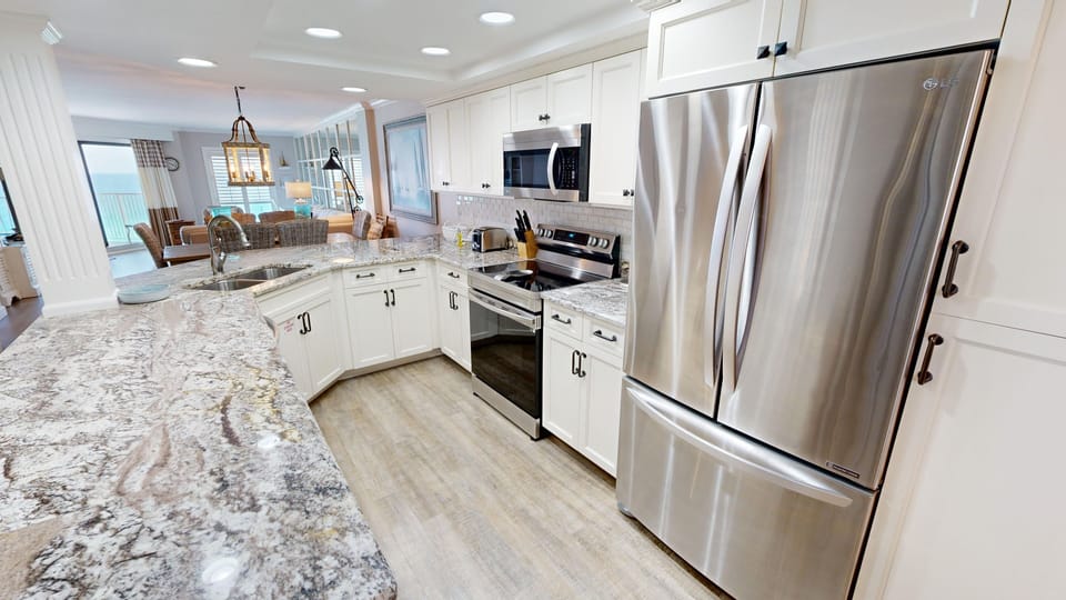 Condo, 2 Bedrooms | Private kitchen | Fridge, microwave, oven, dishwasher