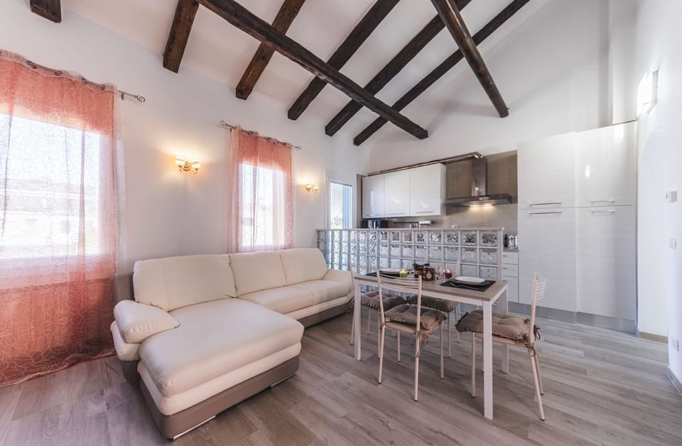 Deluxe Apartment, Multiple Beds, Non Smoking, Canal View | Living area | 40-inch flat-screen TV with digital channels, TV