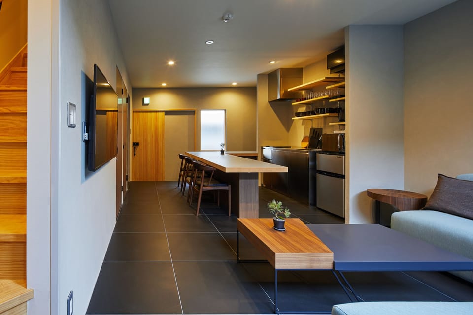 Room with Private Cypress bath | Living room | Flat-screen TV