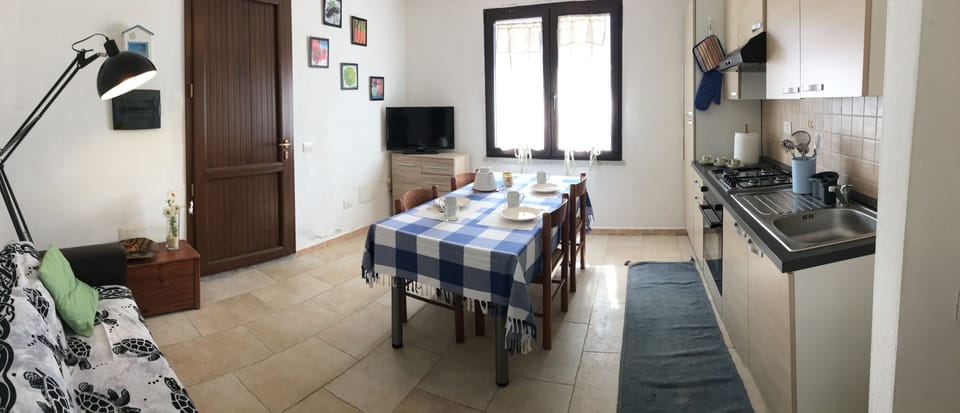 Family Suite, 2 Bedrooms, Valley View | Private kitchen | Highchair, freezer, dining tables