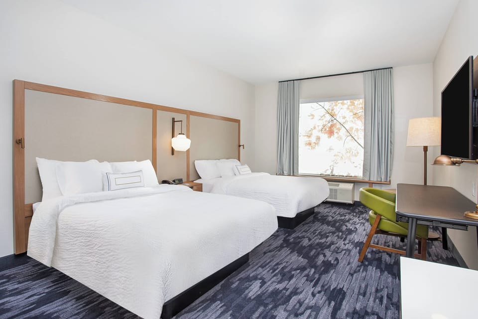 Room, 2 Queen Beds | Desk, blackout drapes, iron/ironing board, cribs/infant beds