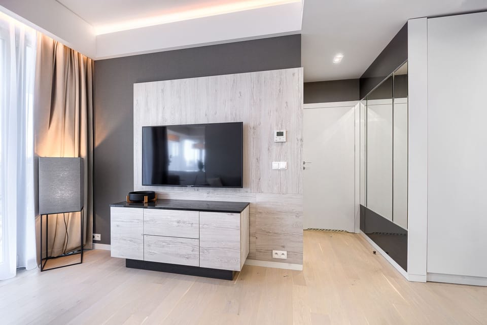 Deluxe Apartment, 1 Bedroom, Sea View | Living area | Flat-screen TV
