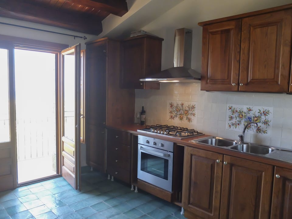 Apartment, 1 Bedroom, Sea View | Private kitchen | Full-size fridge, oven, stovetop, electric kettle