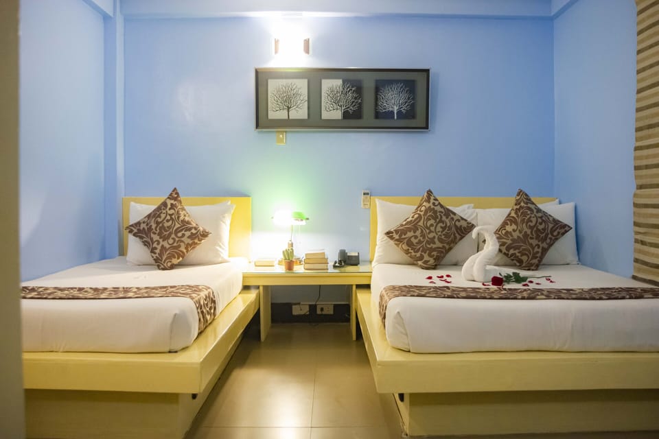 Family Room | Premium bedding, in-room safe, desk, soundproofing