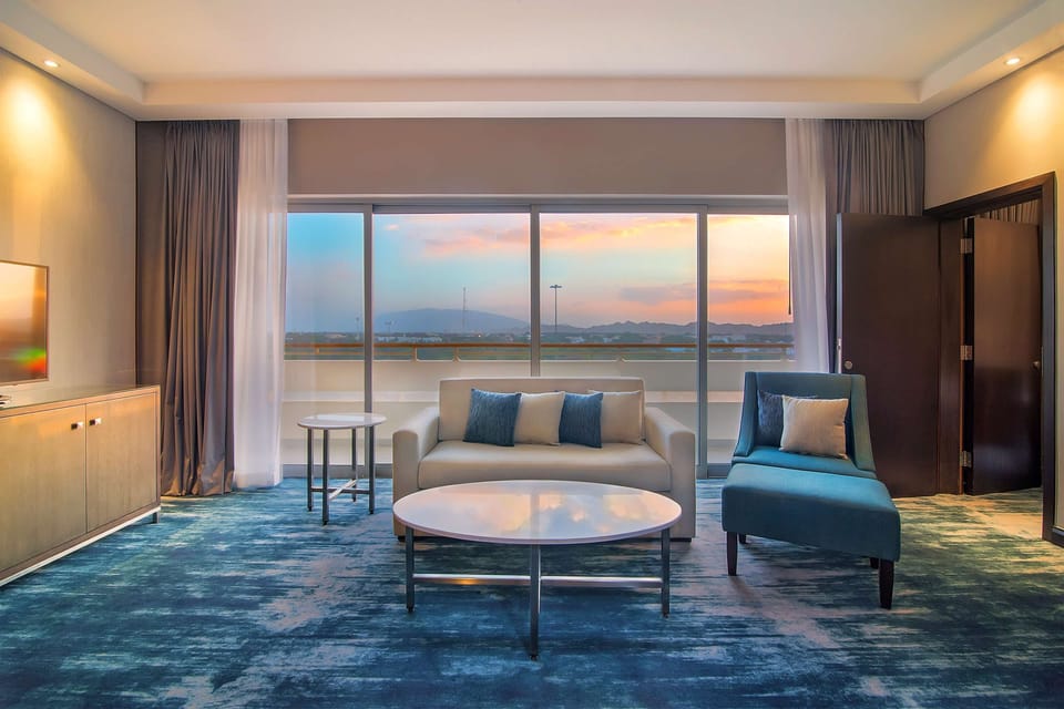 Suite, 1 Bedroom, Balcony | 1 bedroom, Egyptian cotton sheets, premium bedding, in-room safe