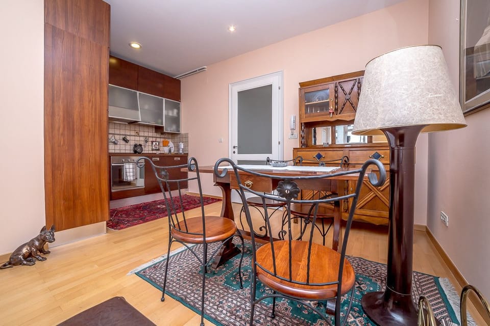 Apartment, Balcony, City View | In-room dining