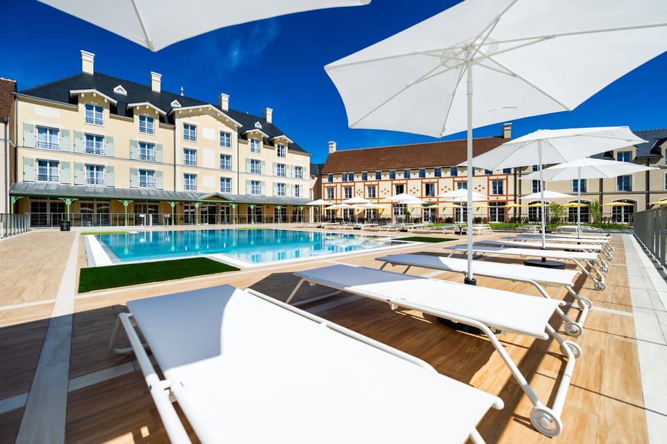 Seasonal outdoor pool, open 9:00 AM to 8:00 PM, sun loungers