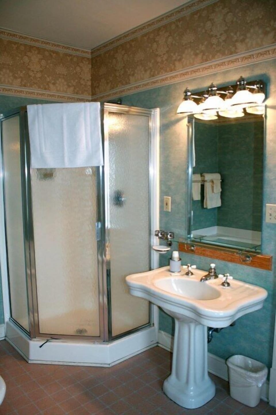 Rainfall showerhead, designer toiletries, hair dryer, towels