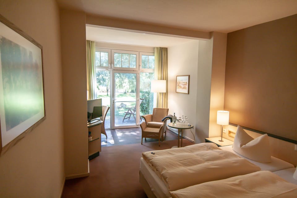 Twin Room | Minibar, in-room safe, desk, blackout drapes