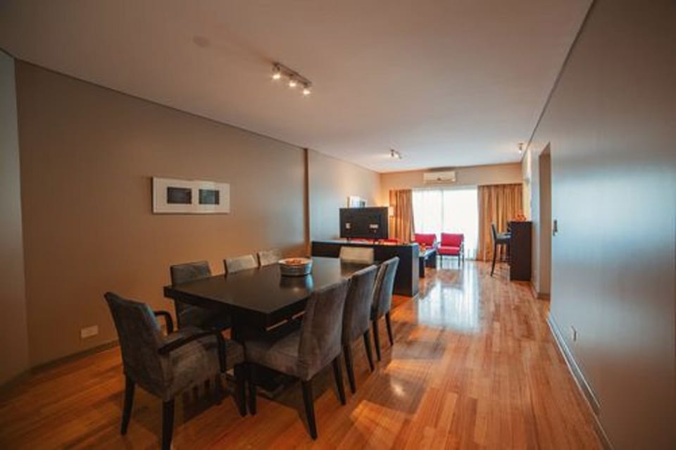 Senior Suite | Living area | 42-inch Smart TV with cable channels, TV