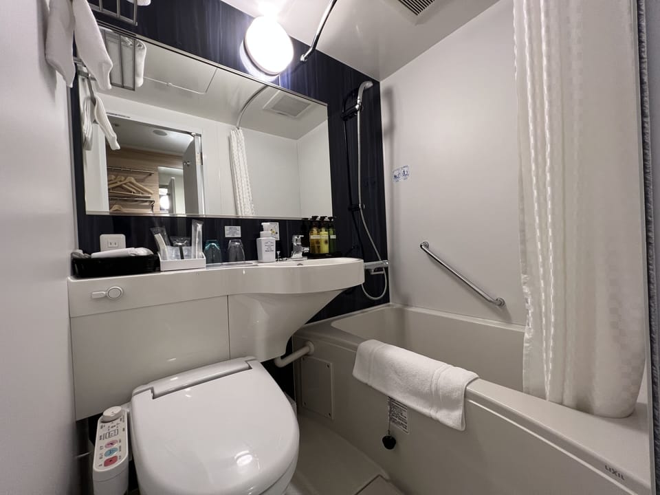 Combined shower/tub, free toiletries, hair dryer, bathrobes