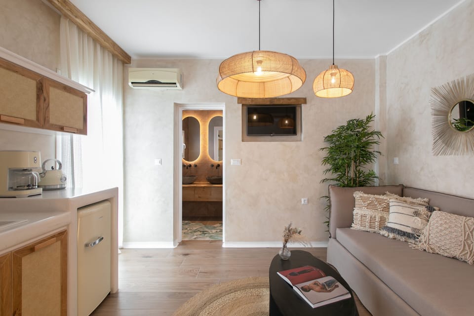 King Suite Balcony | Living area | Flat-screen TV