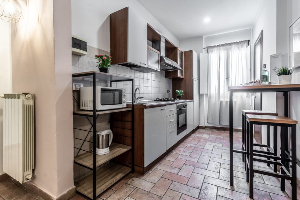 Family Apartment, 3 Bedrooms | Private kitchen | Full-size fridge, microwave, oven, stovetop