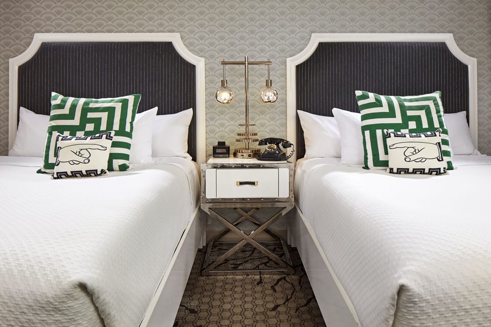 Premium bedding, down comforters, pillowtop beds, in-room safe