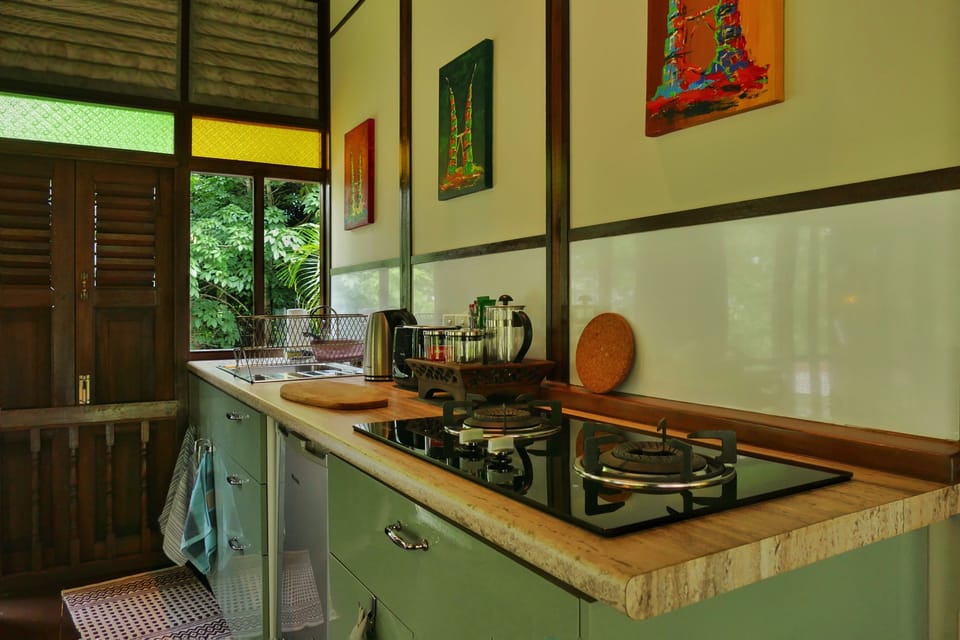 Villa Kayu | Private kitchen | Fridge, stovetop, electric kettle, toaster