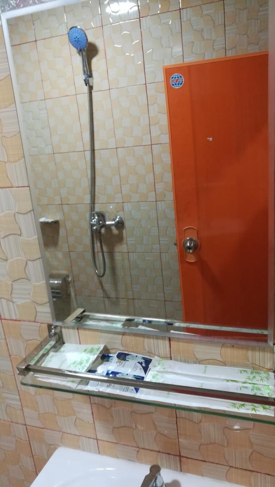 Shower, free toiletries, hair dryer, slippers