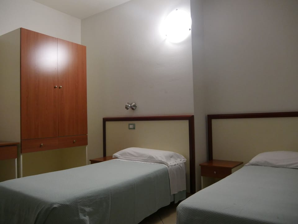 Twin Room | 1 bedroom, desk, free WiFi, bed sheets