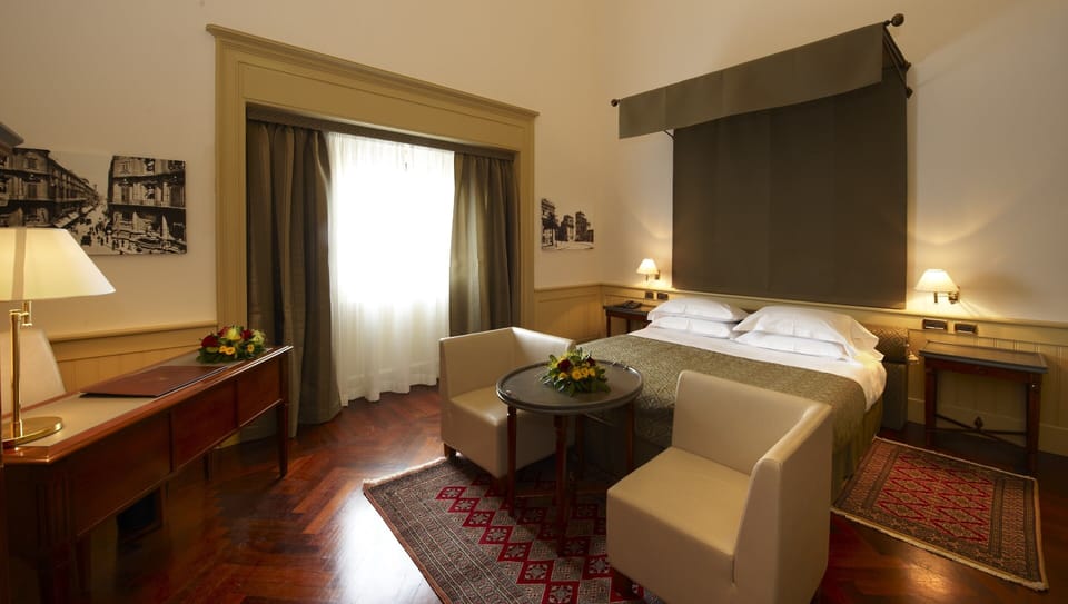 Premium bedding, down comforters, minibar, in-room safe
