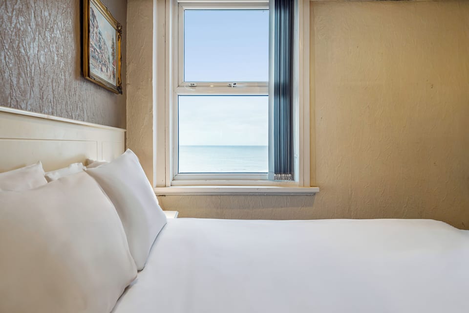 Deluxe Double Room, Sea View | Iron/ironing board, free WiFi, bed sheets
