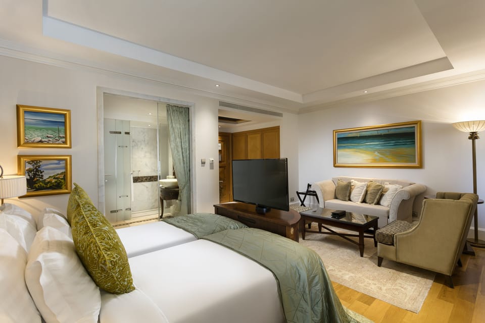 Premium bedding, free minibar, in-room safe, desk