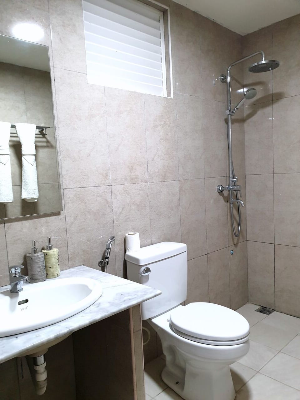 Shower, rainfall showerhead, towels