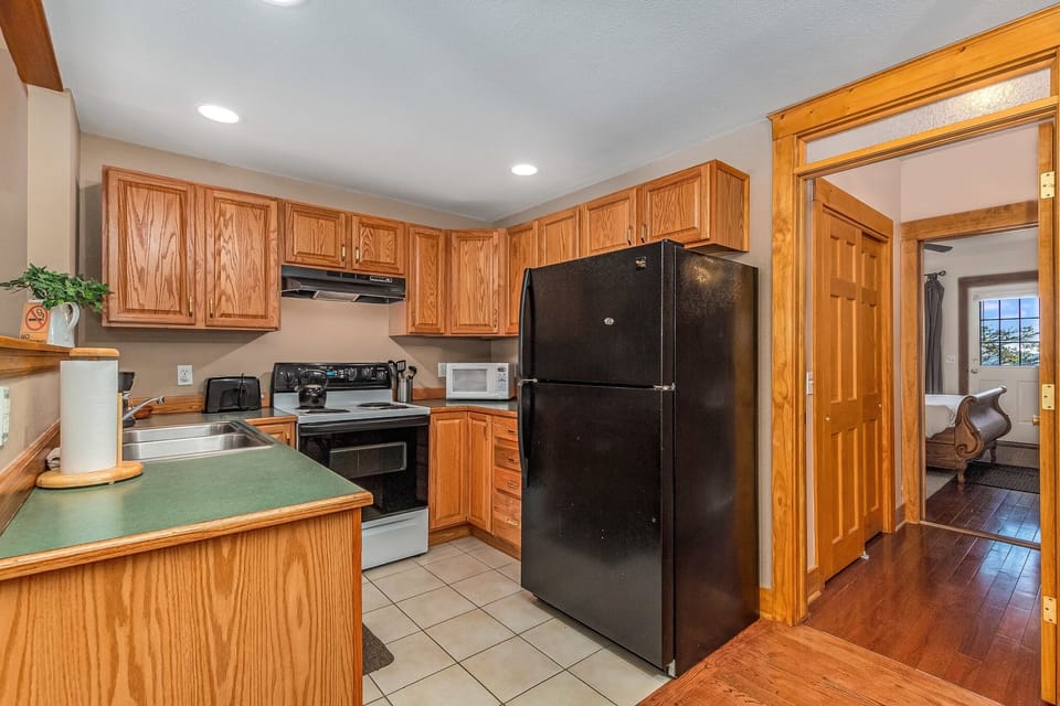 Condo, 2 Bedrooms | Private kitchen | Fridge, microwave, oven, dishwasher