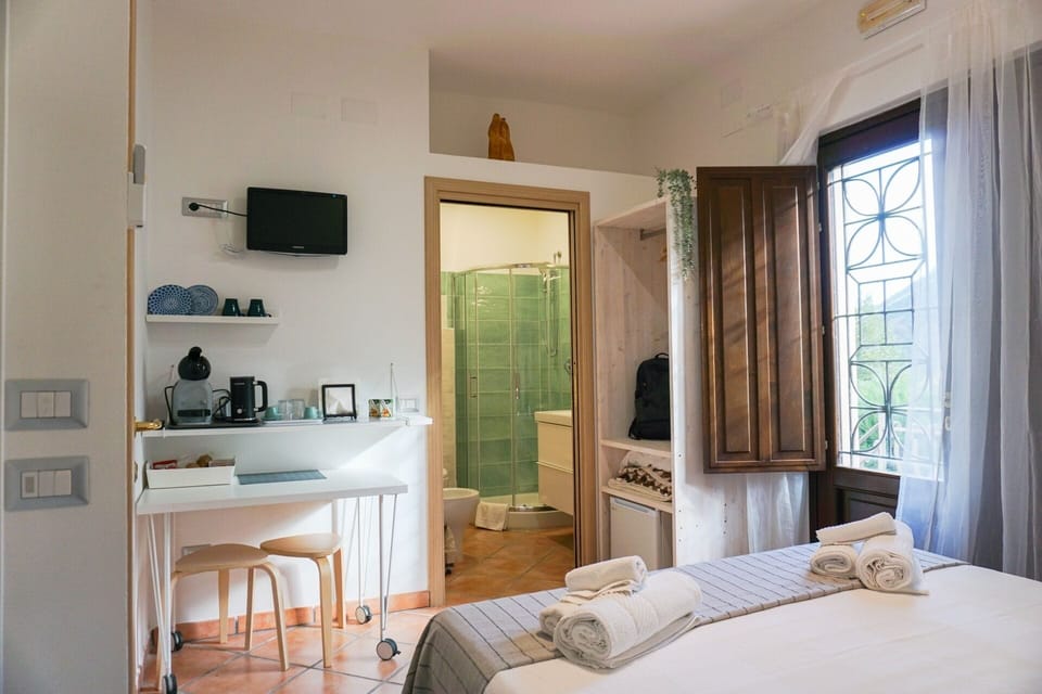 Classic Double Room, 1 Queen Bed, Private Bathroom, Garden View | Down comforters, minibar, desk, soundproofing