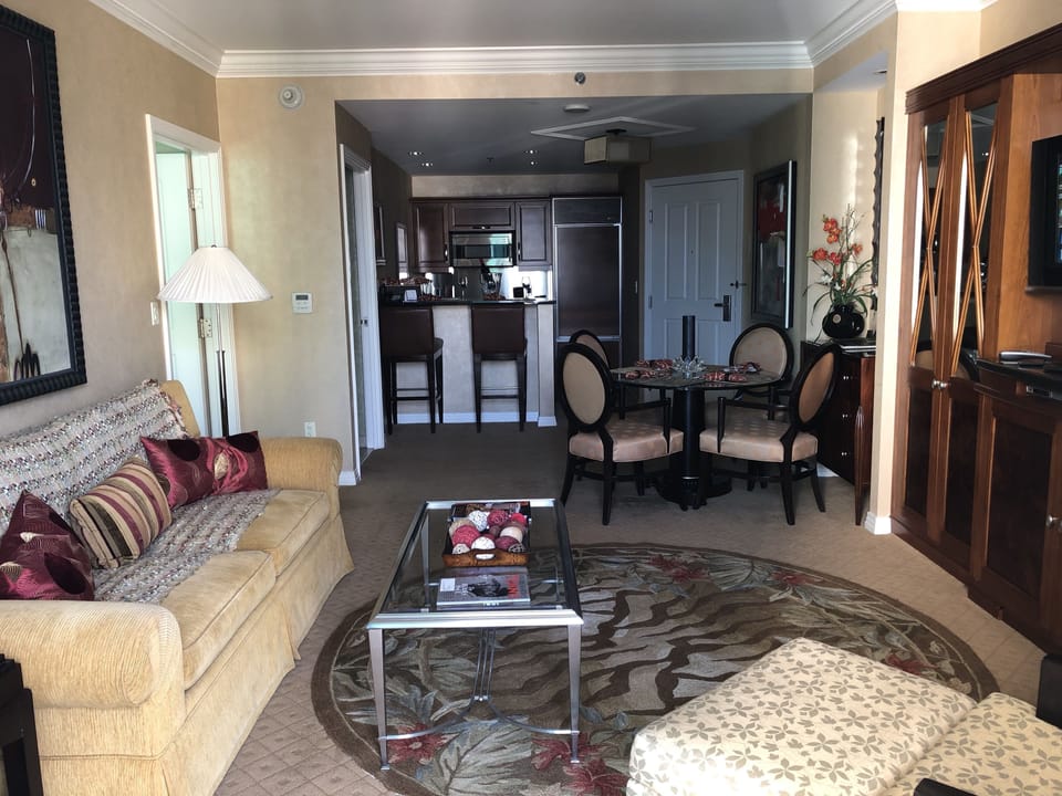 Panoramic Suite, 1 King Bed with Sofa bed, Non Smoking, City View | Living room | 42-inch flat-screen TV with cable channels, TV, iPod dock