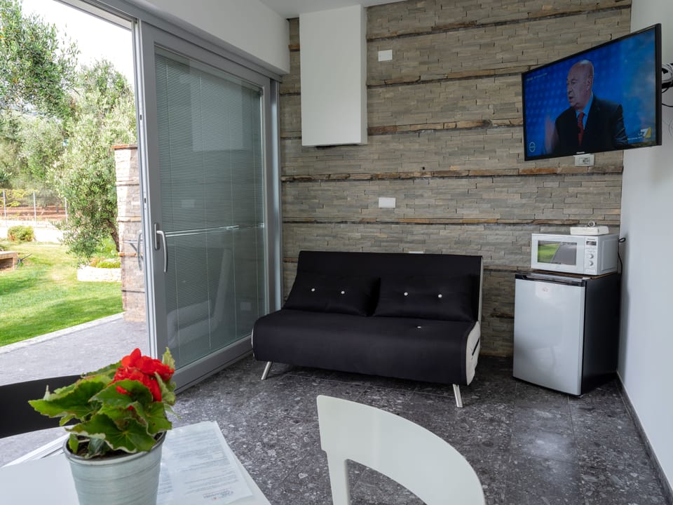 Classic Double Room, Patio | In-room safe, desk, soundproofing, cribs/infant beds