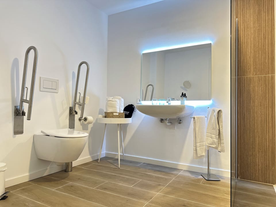 Standard Double Room, Accessible | Bathroom | Shower, free toiletries, hair dryer, towels