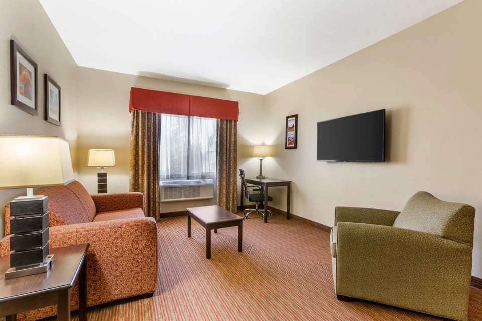 Suite, 1 King Bed, Non Smoking (Sofa) | Premium bedding, desk, iron/ironing board, rollaway beds (surcharge)