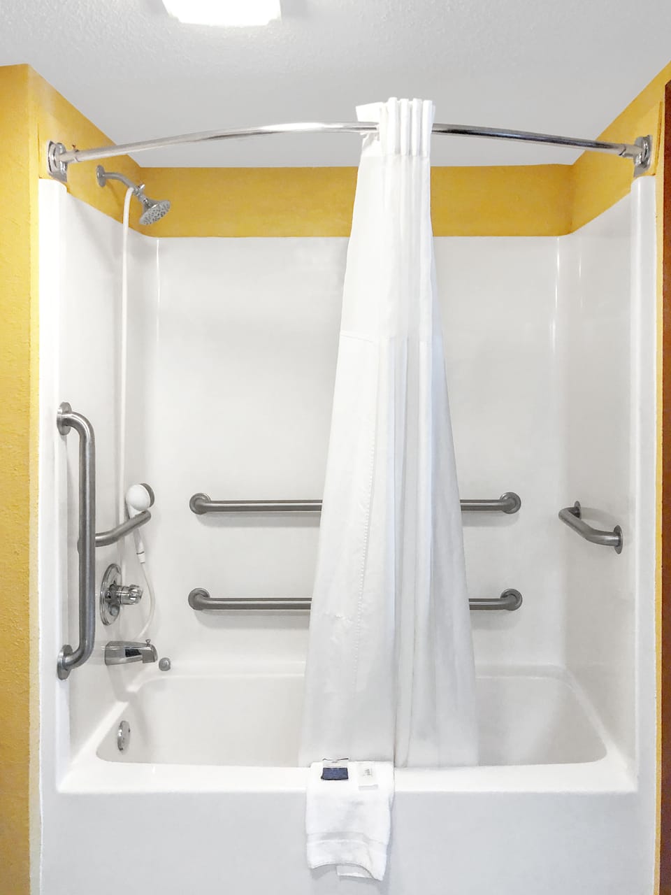 Room, 1 King Bed, Accessible, Non Smoking | Bathroom | Combined shower/tub, deep soaking tub, free toiletries, hair dryer