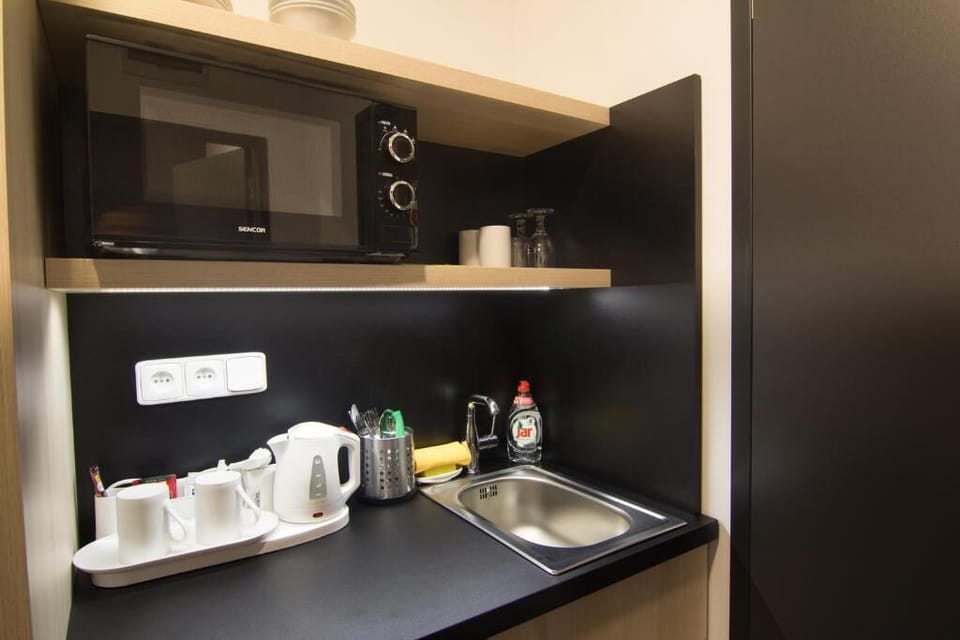 Classic Double Room, City View | Private kitchenette | Mini-fridge, microwave, electric kettle, cookware/dishes/utensils