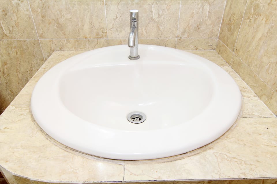 Deluxe Room | Bathroom | Shower, towels